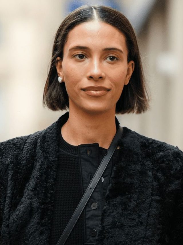 Mulher negra com cabelo short bob, no estilo box bob
