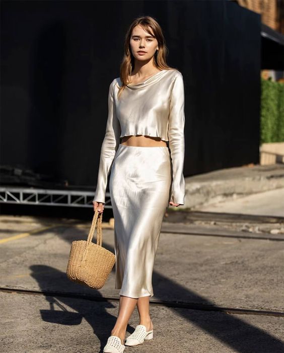 Looks com saia midi