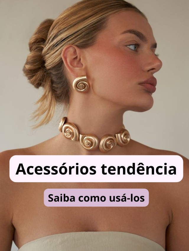 Mulher branca com top branco, coque e acessórios maximalistas