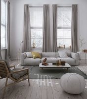 Sala com móveis e cores em tons de cinza
