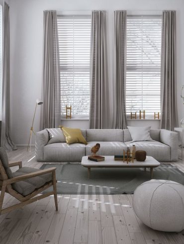 Sala com móveis e cores em tons de cinza