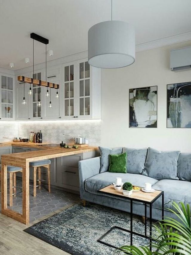 Sala e cozinha integradas com paleta de cor neutra