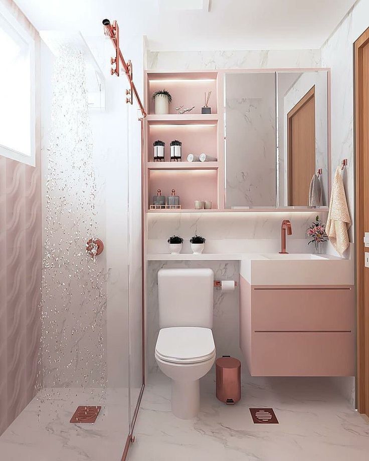 Banheiro em branco e rosa com detalhes em rose gold