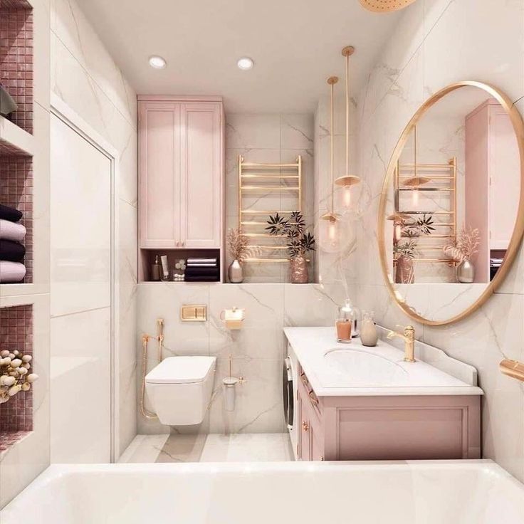 Banheiro em tons claros com rosa e rose gold