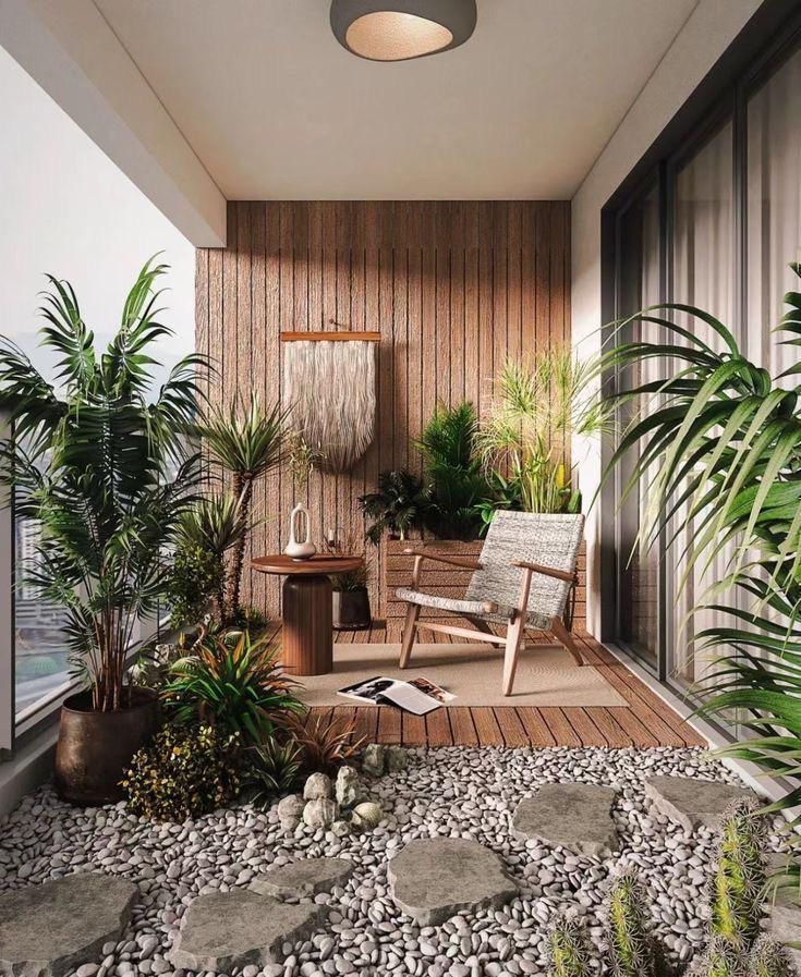 Espaço arejado com plantas e seixos