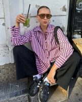 Look com camisa listrada