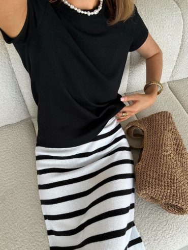 Orlaith Melia usando look preto e branco