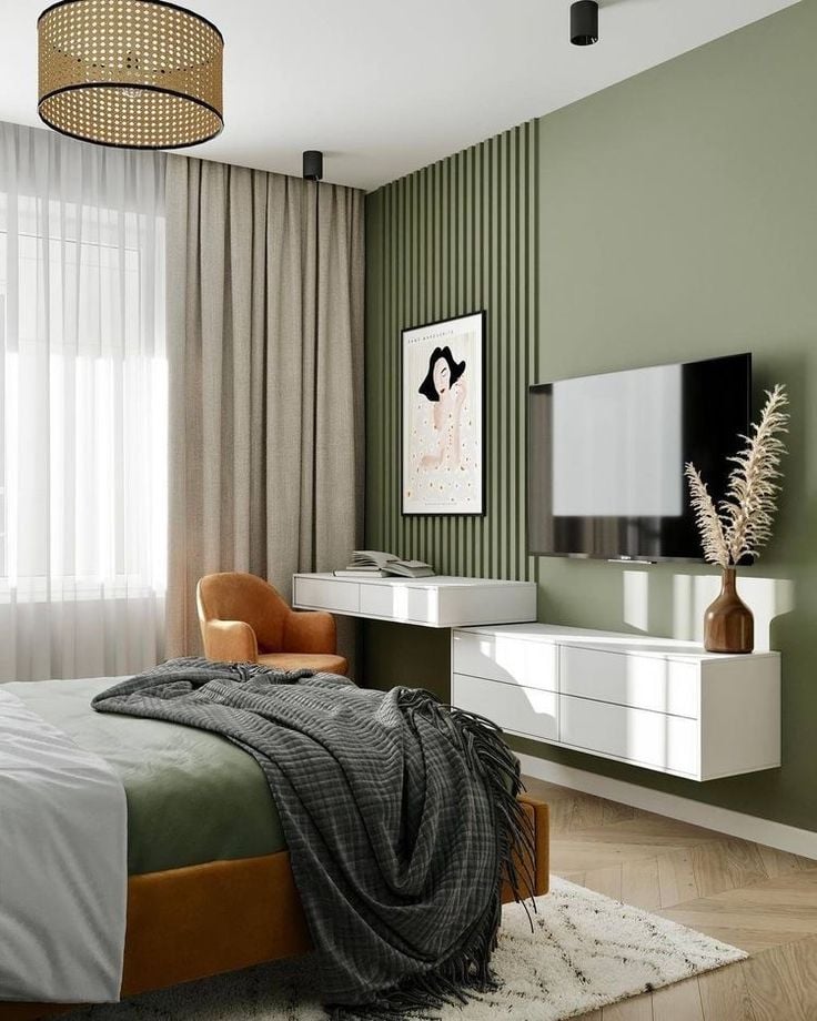 Quarto com parede ripada verde, com penteadeira e móvel aéreo branco