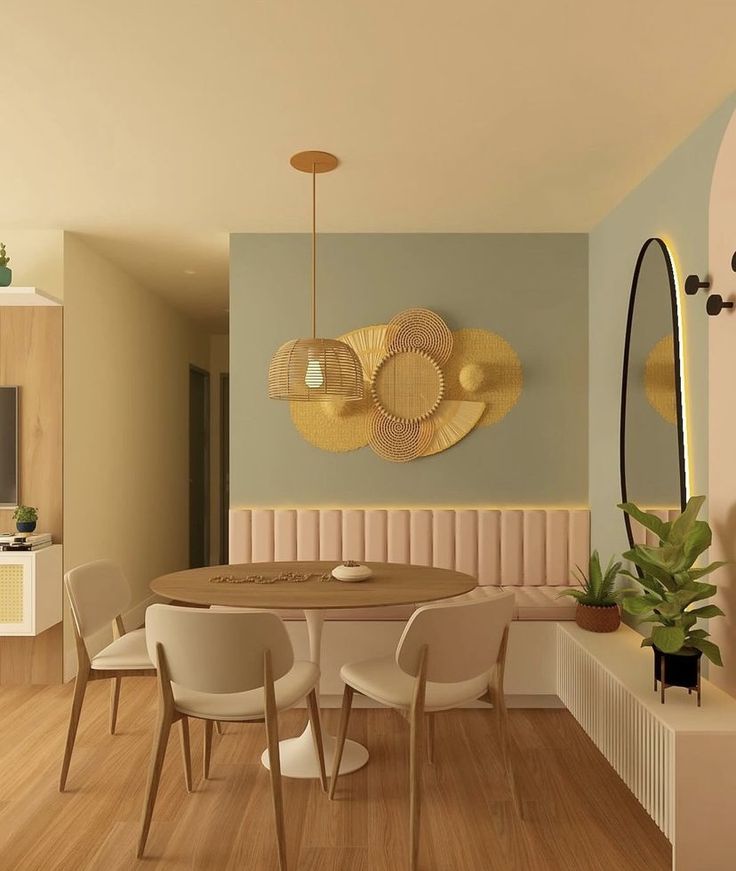 Sala de jantar com canto alemão, parede azul-claro e detalhes em palha