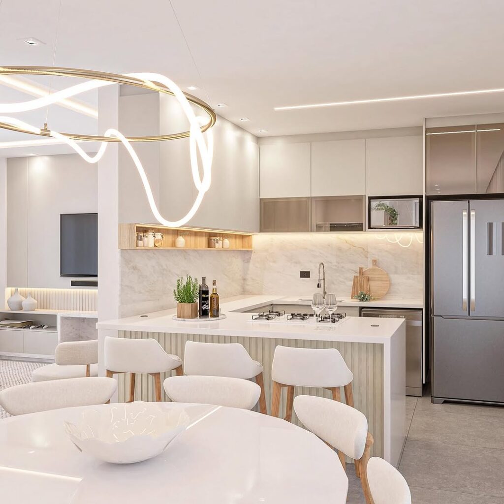 Cozinha com conceito aberto e painel de TV