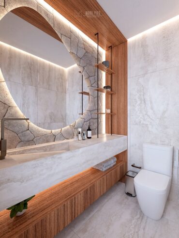 Lavabo pequeno com marcenaria, pedra natural e paredes com revestimento