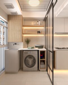 Lavanderia em tons neutros com armário aéreo ripado e prateleiras com luz de led