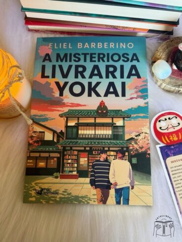 Foto com livro, vela e marca página
