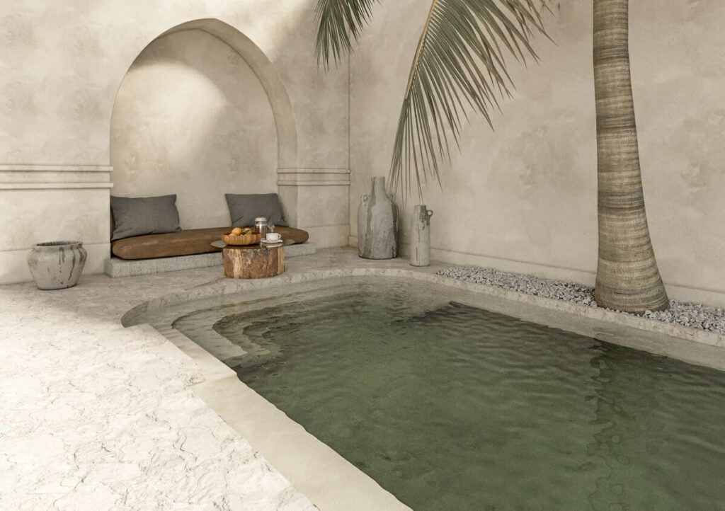 Ambiente externo com piscina, banco de madeira e almofadas