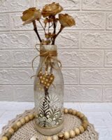 Garrafa decorada com tinta, stencil e barbante