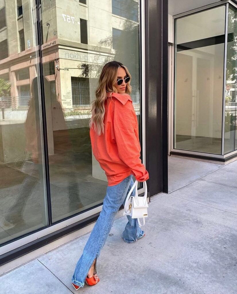 look com blusa laranja e calça jeans