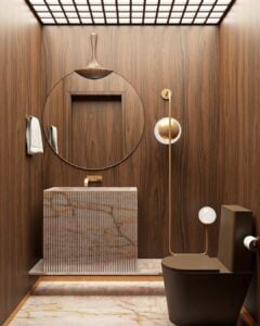 Lavabo moderno marrom com metais dourados