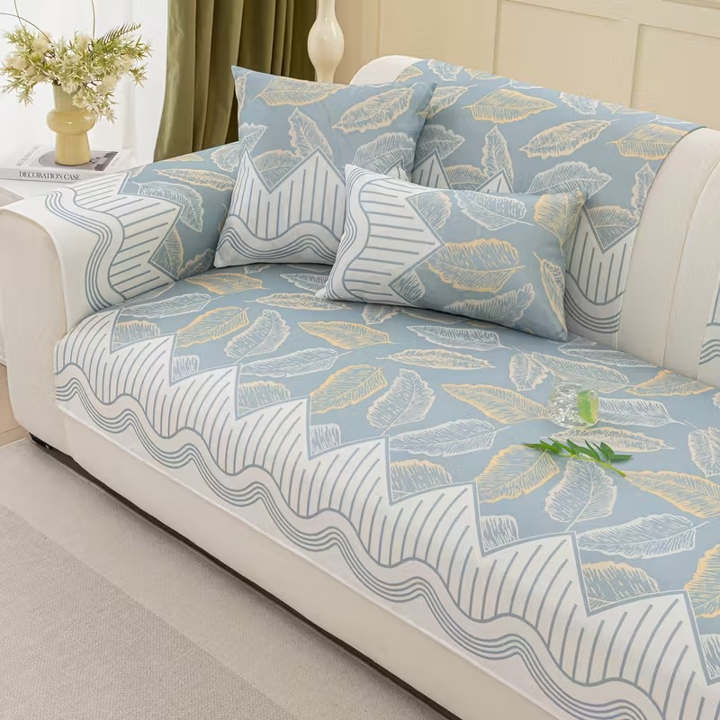 Sofá com capa em branco e azul-claro
