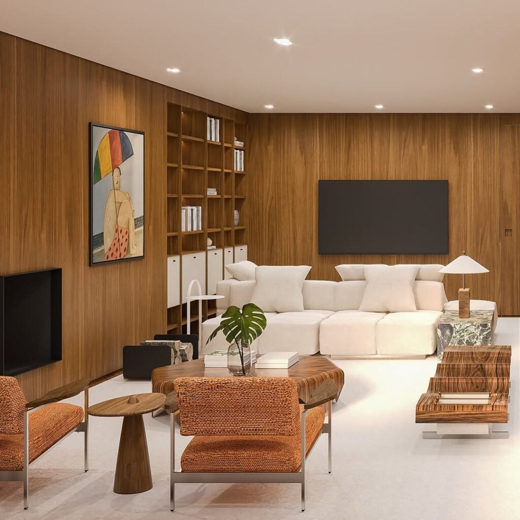 Sala com sofás brancos e paineis de nogueira