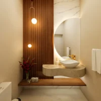Lavabo com bancada suspensa, cuba esculpida, painel ripado e meio espelho redondo