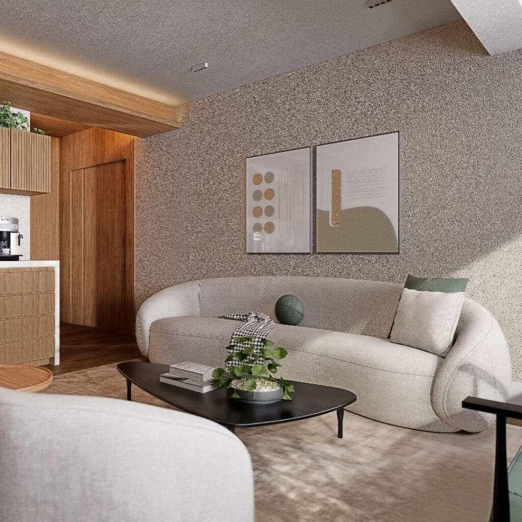 Sala de estar com sofá em formas curvas, mesa de centro preta orgânica e quadros na parede