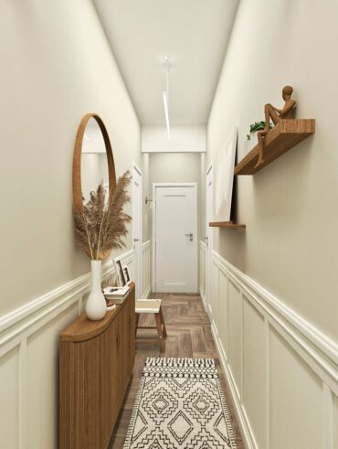 Corredor branco com aparador e prateleira de madeira, objetos decorativos e espelho redondo