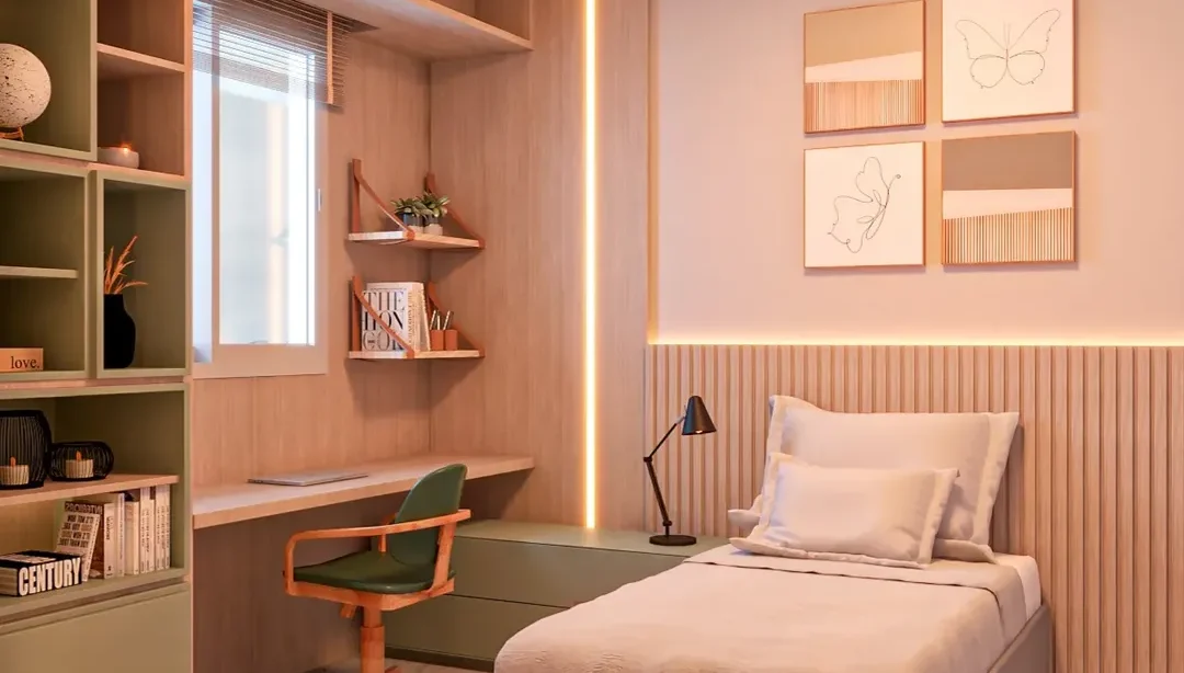 Quarto adolecente em tons rosados, estante verde, escrivaninha em frente à janela e cadeira verde