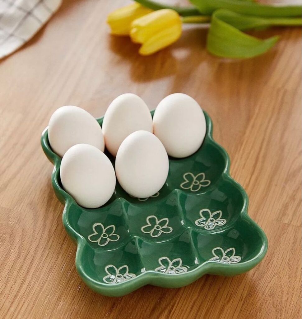 Suporte verde de cerâmica para ovos