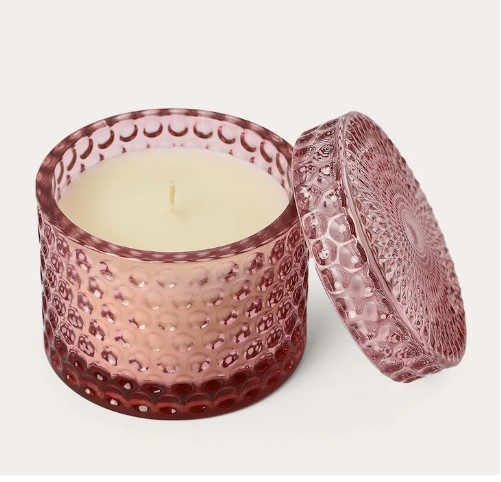 Vela aromática em vidro rosa