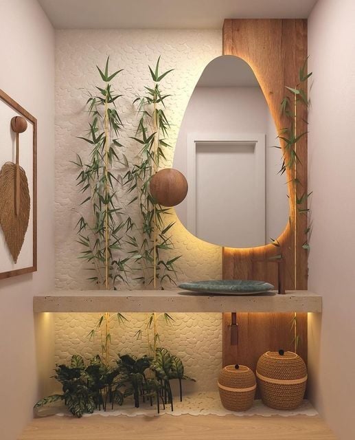 Lavabo pequeno com bancada suspensa, cuba de apoio, espelho orgânico com led e plantas