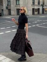 looks com saia e bota
